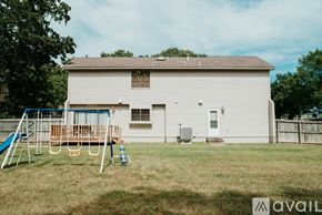 Sherwood house for rent - A house with a playground in the front yard.