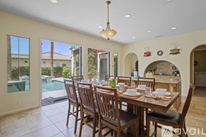 La Quinta house for rent - A dining room with a table set for six.
