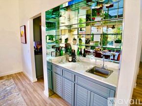 La Quinta house for rent - A kitchen with a sink and a window.