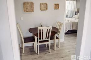 North Hollywood house for rent - A dining room with a table and chairs.