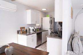 Los Angeles apartment for rent - A kitchen with white cabinets and stainless steel appliances.