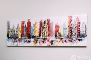 Los Angeles house for rent - A painting of a cityscape with buildings in red, yellow, and blue.