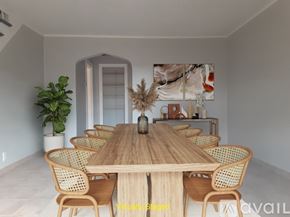 Monongahela house for rent - A dining room with a wooden table and chairs.