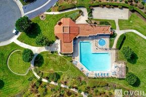 Carlsbad apartment for rent - A house with a pool in the backyard.