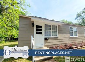 Augusta apartment for rent - A small house with the number 1202 on the front door.