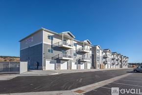 Piedmont apartment for rent - A row of modern townhouses with a clear blue sky above.