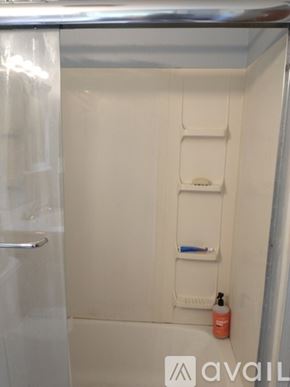 Brooktondale apartment for rent - A wooden deck with chairs and a hot tub.