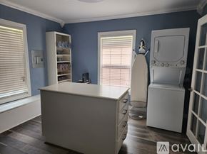 Keithville house for rent - A kitchen with a white counter and a white fridge.