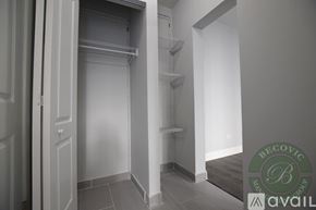 Chicago apartment for rent - A white interior space with a doorway leading to a hallway.