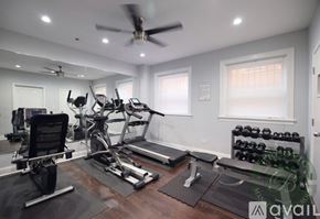 Chicago apartment for rent - A well-equipped home gym with a variety of exercise equipment.
