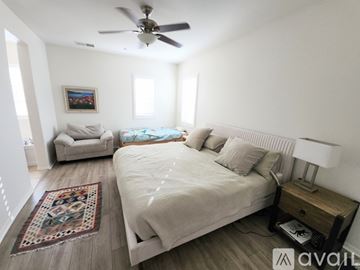 Chula Vista apartment for rent - A living room with a large abstract painting on the wall.