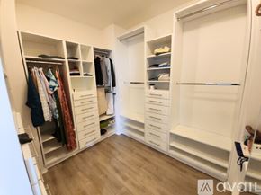 Chula Vista apartment for rent - A bedroom with a large bed and a ceiling fan.