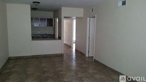 Phoenix apartment for rent - A room with a kitchen area and a living room area.