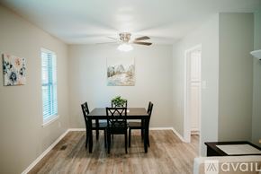 Jacksonville house for rent - A dining room with a table and chairs.