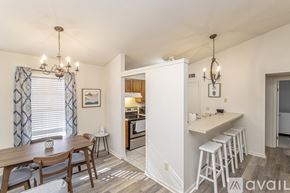 Little Rock house for rent - A kitchen area with a dining table and chairs.