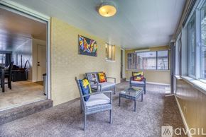 Lakewood townhouse for rent - A sunny day at the beach with people enjoying the water.
