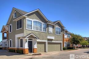 Lewisville apartment for rent - A two-story house with a garage is available for sale.