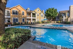 Lewisville apartment for rent - A pool surrounded by apartment buildings with a "NO DIVING" sign.