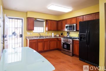 Phoenix house for rent - A living room with a dining table and chairs.