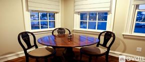 Norwalk apartment for rent - A table with two chairs in front of a window.