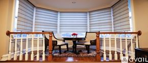 Norwalk apartment for rent - A dining room with a table and chairs.
