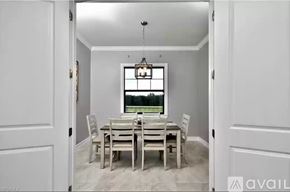 Naples apartment for rent - A dining room with a table set for four.