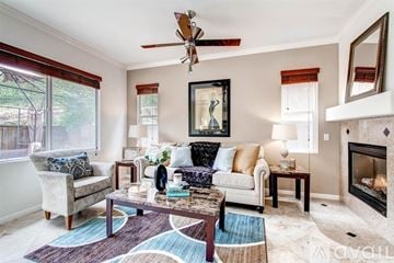 National City house for rent - A living room with a fireplace and a painting on the wall.