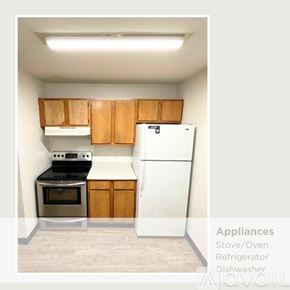 Emmetsburg apartment for rent - A kitchen with a stove, oven, refrigerator, and dishwasher.