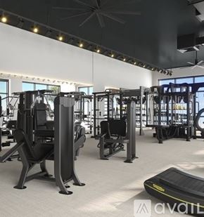 St. Petersburg apartment for rent - A gym with various exercise machines and a treadmill.