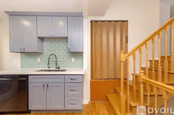Auburn apartment for rent - A kitchen with a sink and cabinets.