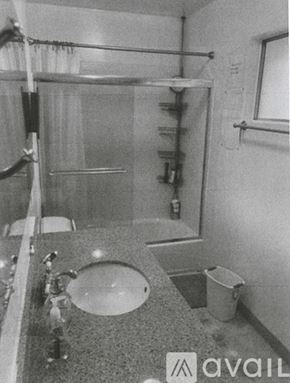 Lake Forest house for rent - A bathroom with a sink, toilet, and shower.