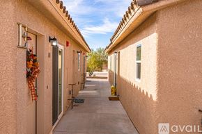 Lake Havasu City condo for rent - A row of houses with a clear blue sky above them.