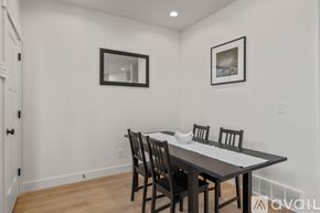 Lehi apartment for rent - A dining room with a table and chairs.