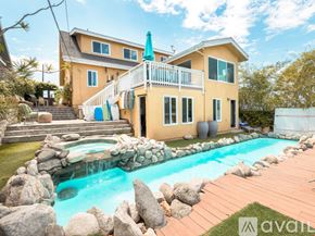 El Segundo townhouse for rent - A house with a pool in front of it.