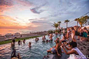 El Segundo apartment for rent - A group of people are enjoying a sunset by the pool.