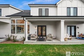Midvale townhouse for rent - A modern house with a front porch and a covered entrance.
