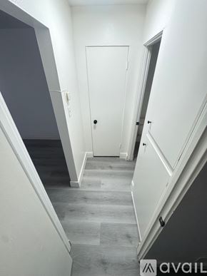 Azusa apartment for rent - A room with a grey floor and white walls.