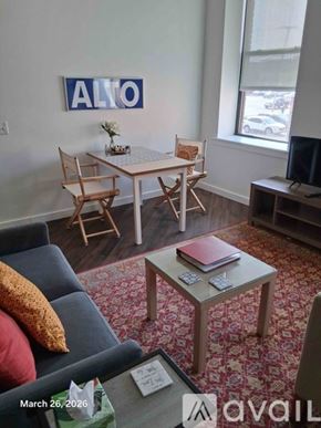 Altoona apartment for rent - A living room with a couch, chair, and a coffee table.