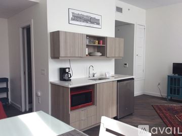 Altoona apartment for rent - A kitchen with a white countertop and a microwave oven.