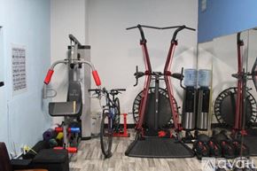 Los Angeles apartment for rent - A gym with exercise equipment including a stationary bike and a rowing machine.
