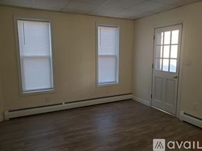 Williamsport house for rent - A room with two windows and a door is available for rent.