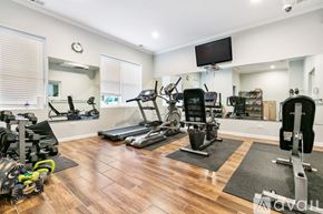 Chicago apartment for rent - A well-equipped home gym with a variety of exercise machines.