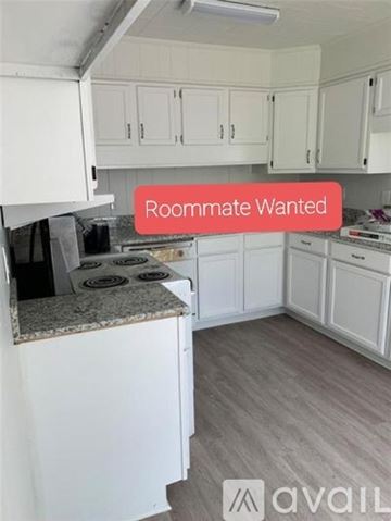 Marrero apartment for rent - A kitchen with a countertop and cabinets is available for rent.