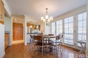 San Diego house for rent - A kitchen with a dining table and chairs.