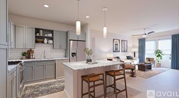 Wesley Chapel apartment for rent - A modern kitchen with a bar area and a living room with a couch and a coffee table.