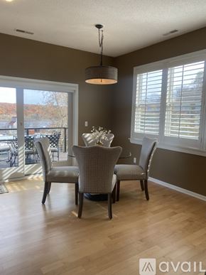 Stillwater apartment for rent - A dining room with a table set for four.