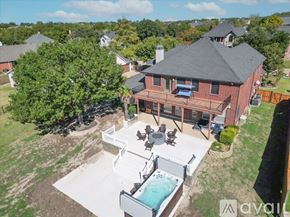 Rockwall house for rent - A house with a pool in the backyard.
