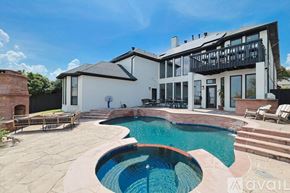 Rowlett house for rent - A modern house with a pool in the backyard.