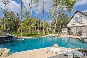 Keller house for rent - A house with a pool in the backyard.