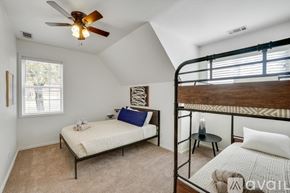 Keller house for rent - A bedroom with a bunk bed and a single bed.